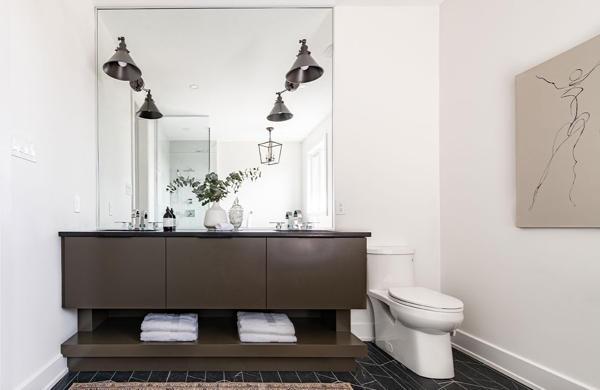 Elegant display of home design samples including flooring, kitchen cabinetry, and fixtures at Glenview Homes' Ottawa studio.